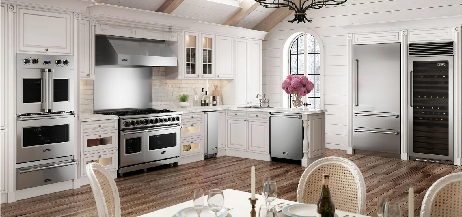 Viking professional kitchen — range, wall ovens, refrigeration, and wine cellar